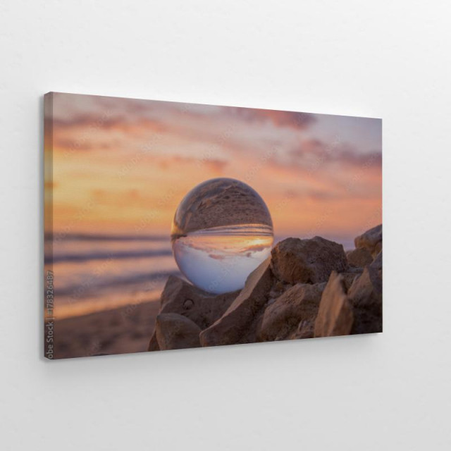 Obraz na płótnie Zachód słońca w kryształowej kuli